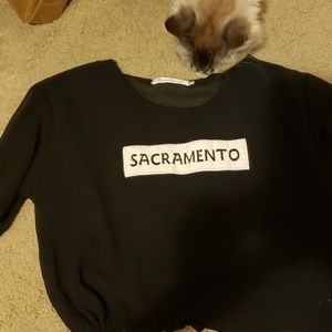 Sacramento logo black seethrough top